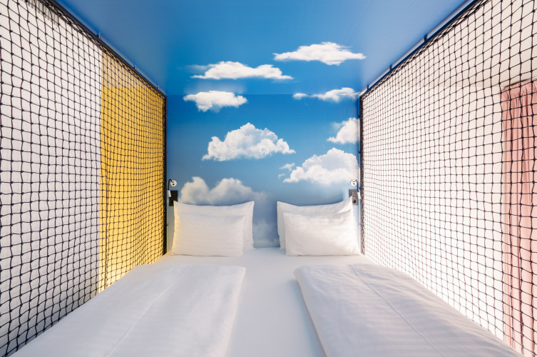 Bed in the Smart Maisonette Room at Hotel Schani Wien