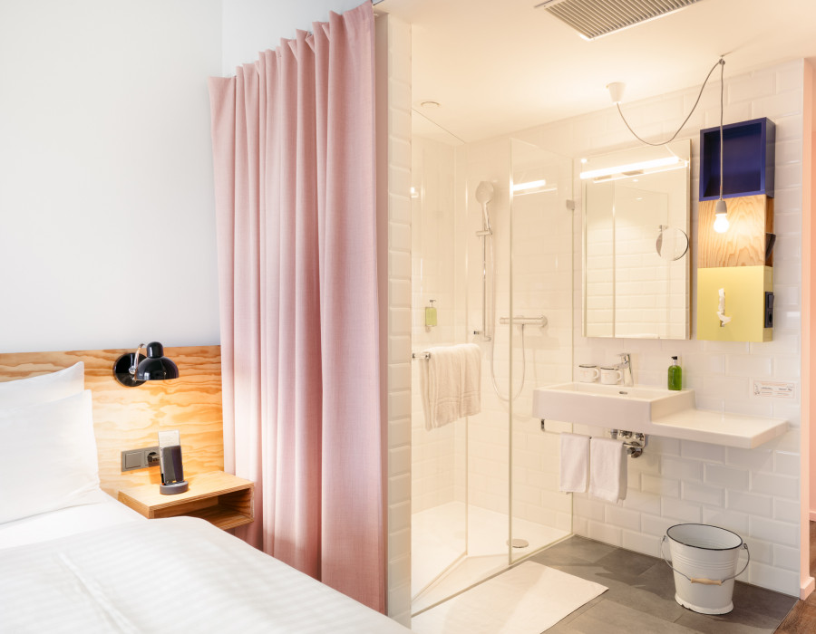 Open bathroom in Smart Garden Room at Hotel Schani Wien 